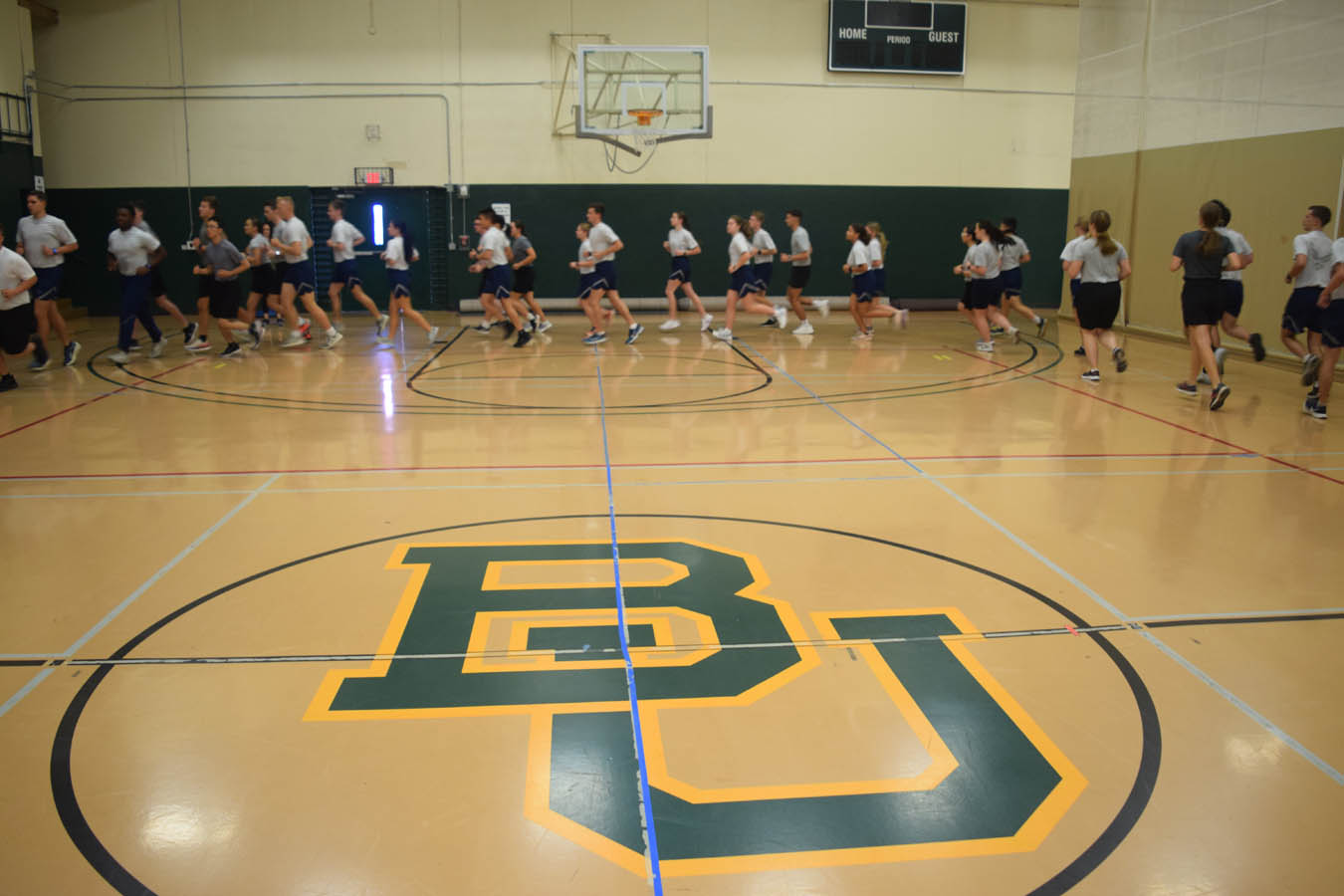 Cadets running in gym